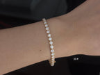 Bracciale Tennis Cyre-The Orbit indossato al polso diamanti lab-grown taglio brillante Cyrediamond