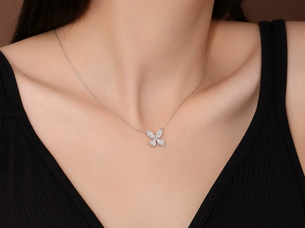 Cyrediamond Papilio necklace detail showing oval and teardrop lab-grown diamond setting in white gold